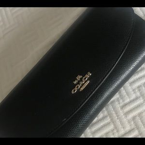 Black leather coach wallet